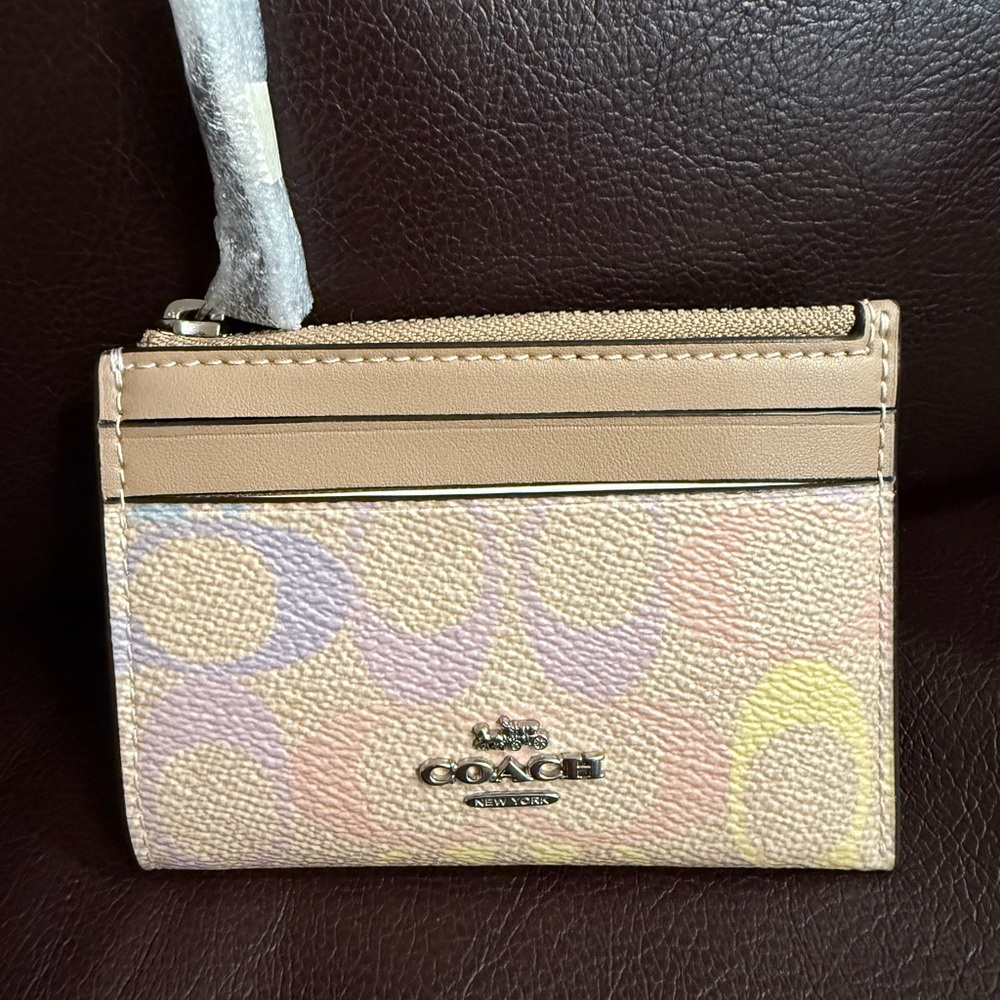 Coach Mini Skinny Id Case
In Rainbow Signature Canvas